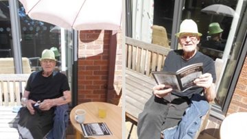 Nottingham care home Resident enjoys reading a book in the sun
